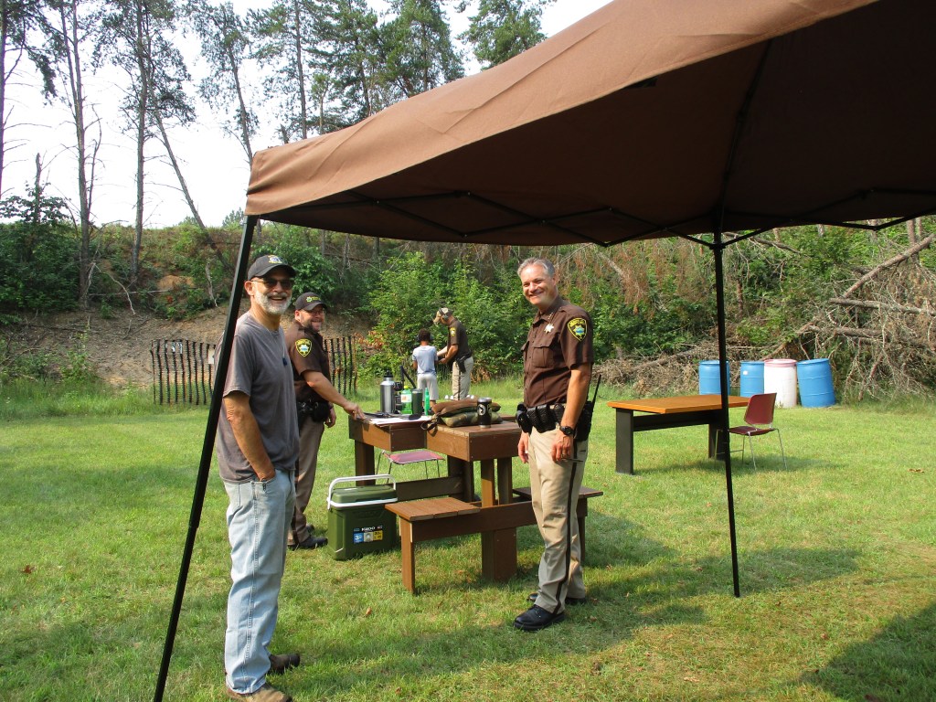 Oconto County Sheriff's department teaching youth how to shoot .22 pistols.